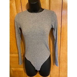 Gray long sleeved bodysuit.